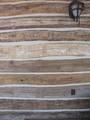 Hand-Hewn Skins Siding Close-Up Hand-Hewn Skins Siding Close-Up